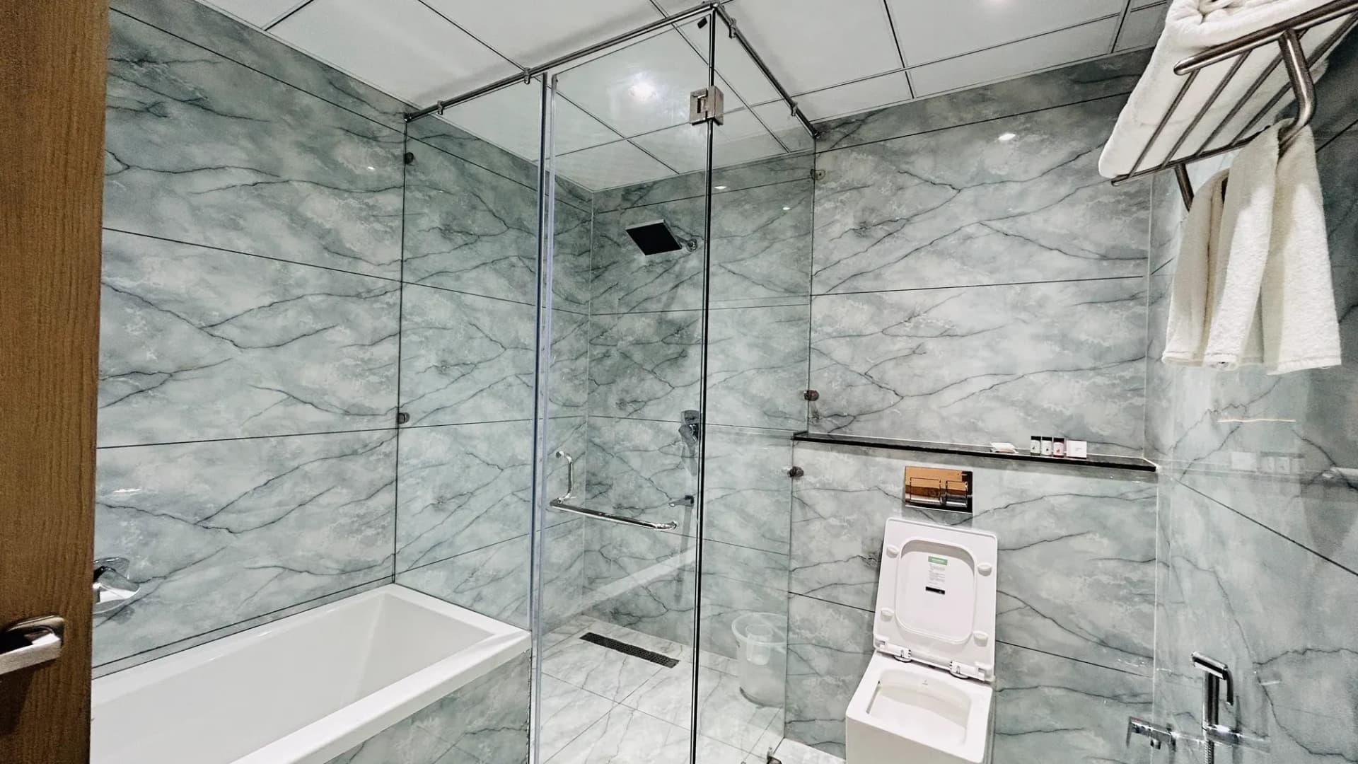 Glass-partition shower in a Jay Mahal bathroom