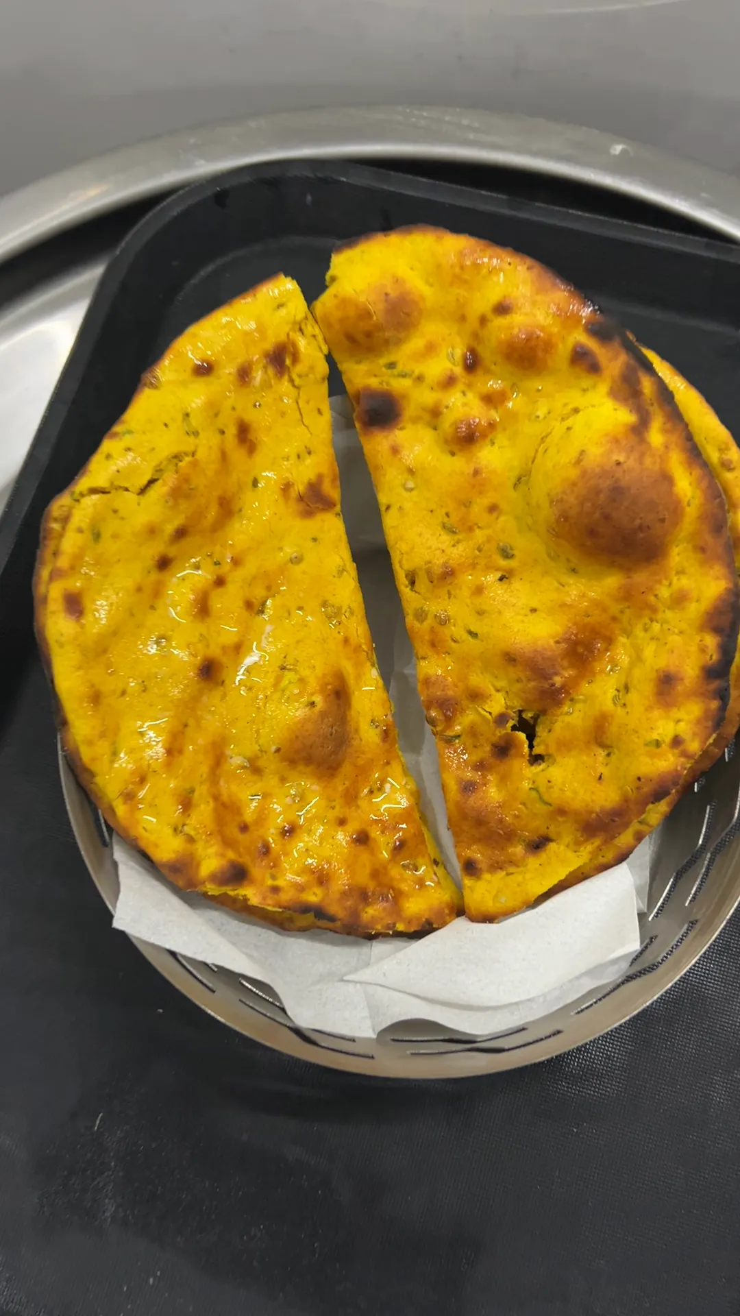 Golden crispy fritters served hot at Jay Mahal