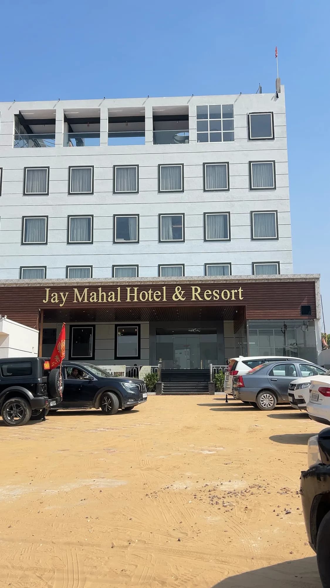 Jay Mahal Hotel & Resort facade against a blue sky